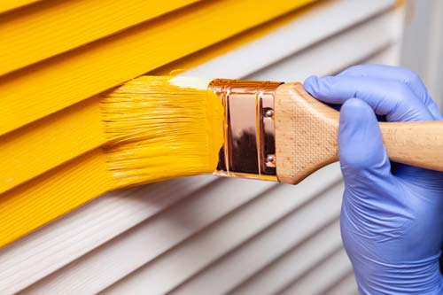 Yellow siding painting